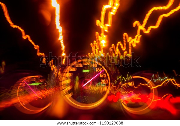 High speed road drive on night highway\
light trail with auto gauge speedometer\
blurry