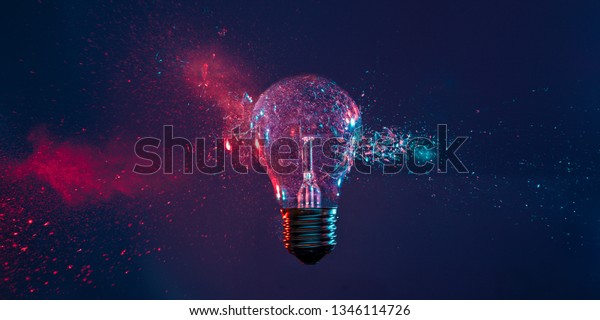 High speed studio\
photography, moment of the impact of a bullet on a classic electric\
bulb. Detail of glass explosion, blue and purple lighting. Concept\
of obsolete energy.