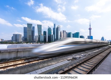 High Speed Train With City Skyline In Shanghai China