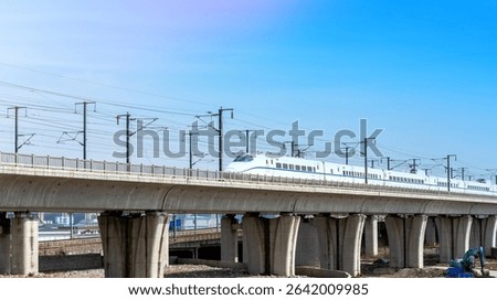 The high speed train Harmony under the sunset