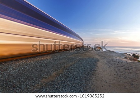 High Speed Train passing through Del Mar Heights along Pacific Coastline in San Diego County Southern California