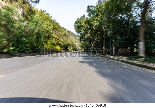 high speed view of asphalt\
road