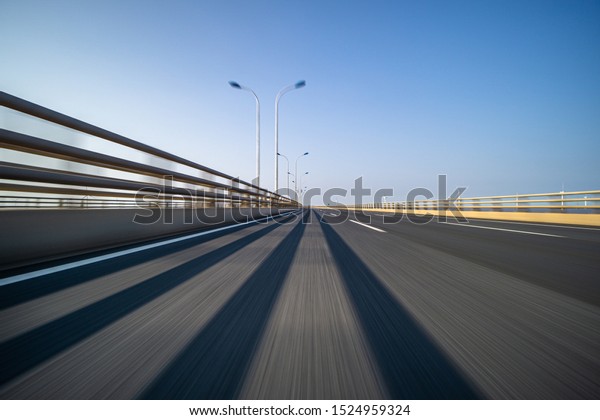 high speed view of asphalt\
road