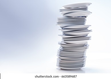 High Stack Of Plates, Isolated On White