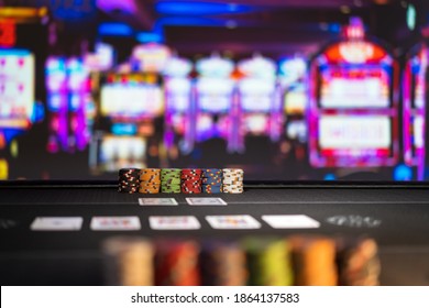 High stakes Texas hold 'em poker game at the casino - Shutterstock ID 1864137583