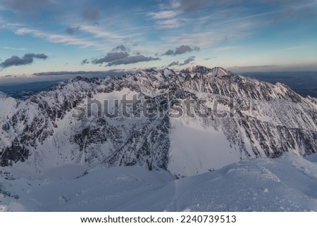 The High Tatras Mountains (Vysoke Tatry, Tatry Wysokie, Magas-Tatra), sunrise view with clear sky and first snow. View from the top of Kriváň Stock foto © 