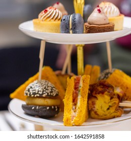 High Tea Tiered Platter With Cakes And Sandwiches