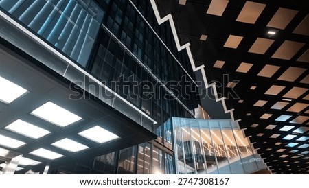 High tech ceiling with LED lighting and geometric pattern in modern building interior, Futuristic architectural ceiling design with illuminated panels and sleek corporate style