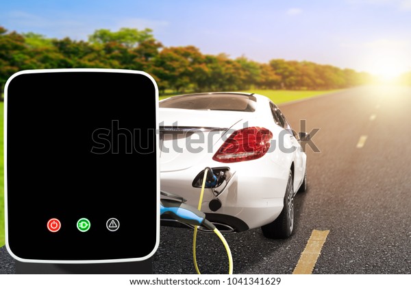 High technology of charging an electric
car on road for clean energy future of
travel