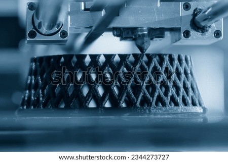 The high technology manufacturing process by rapid prototype method. The simple shape model made by 3D printer machine. 