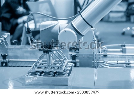 The high technology material handling process by automatic robotic system. The logistic technology in canned food by robotic system.