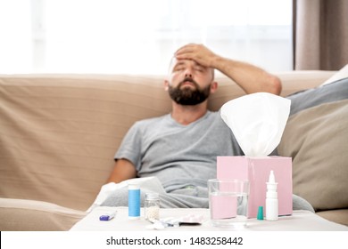 High Temperature Concept. Man Feels Badly Ill. How To Bring Fever Down. Cold Symptoms And Causes. Sick Man With Flu. High Fever And Headache Because Of Influenza Virus