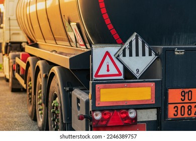 High temperature liquid hazard and miscellaneous hazard label on dangerous goods tank truck.
