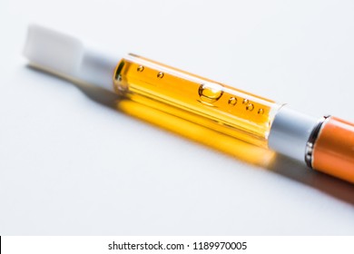 Two Vape Pen THC/CBD Oil Vape Pen Cartridges & Cannabis Leaf Stock Photo,  Picture And Royalty Free ImageImage 132074375.