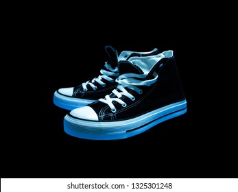 High Top Sneakers On Black Background