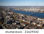 High view of Boston from From Observation Deck Of Prudential Tower. Harvard Bridge over the Charles River leads to Cambridge.