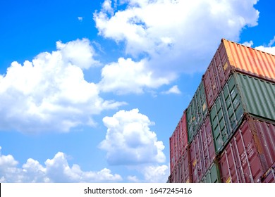 High up view industrial container storage  in warehouse terminal for packing products for transportation on blue sky background, import and export on shipping business, copy space