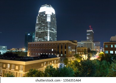 High view of a night skyline over a small portion of the city of winston salem North carolina shot late at night 