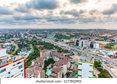 High View Point Cityscape Of Accra, Ghana. Traffic Jam On George Bush Highway With Hills On The Background