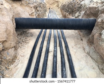 The high voltage electrical cable is laid in a trench under existing engineering sewerage networks