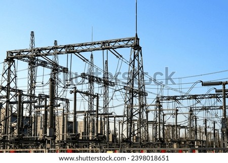 High voltage electricity line in Ukraine, electrical substation. Russian missile attacks on Ukrainian energy during war. Blackout, saving energy, light. Power plant in Ukraine
