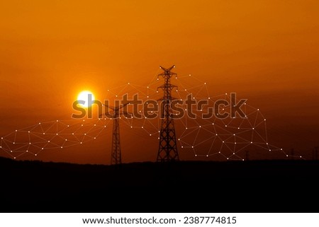 High voltage line. The city's energy transmission line. Electric towers in sunset landscape. Yellow sun disk. Horizontal photo. No people, nobody. 