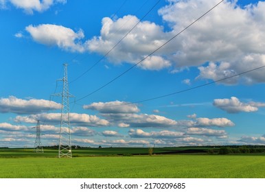 High voltage line on a background of blue cloudy sky