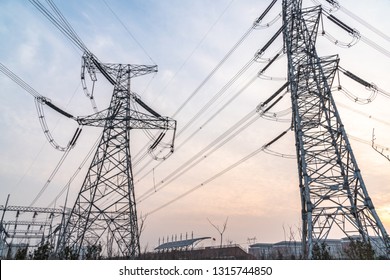 High voltage pole during sunset