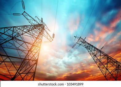 high voltage post at sunset