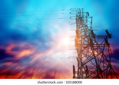 high voltage post at sunset - Shutterstock ID 105188000