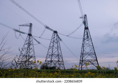 High voltage post or High voltage tower in the field. High voltage towers with sky background. A high voltage power pylons in Ukraine - Shutterstock ID 2208656839