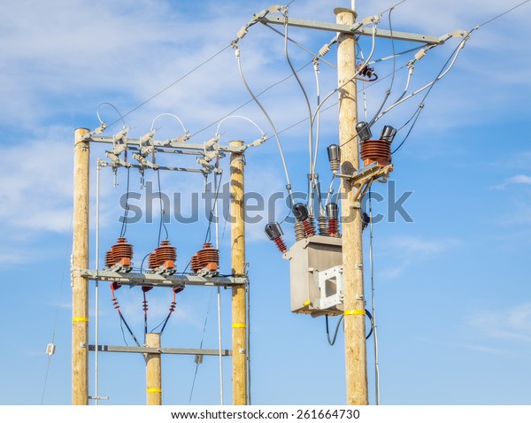 High\
voltage power divider and transformer on blue sky\
\
