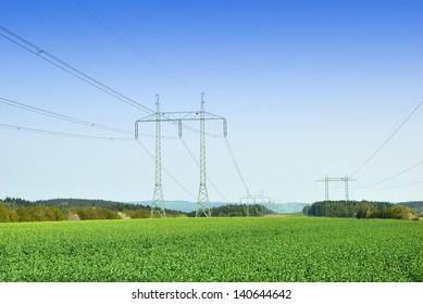 High Voltage Power Lines And Countryside