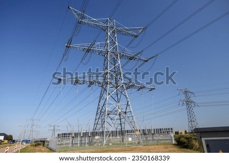 High voltage powerlines of Tennet at powerstation Hessenweg in Zwolle in the Netherlands