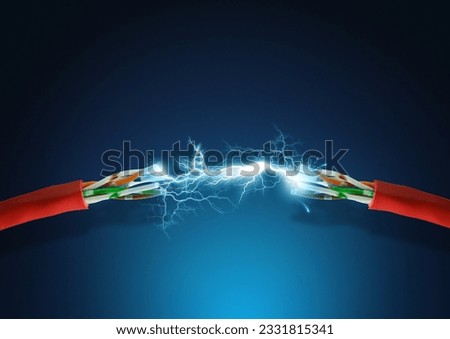 High voltage spark between two cables.