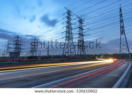 High voltage, high speed road car track in the background of high voltage towers Stock photo © 