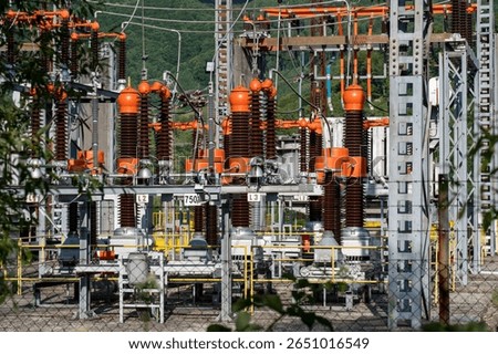High voltage switch. High voltage electrical transformer substation. Power station. Power line.