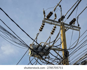 High Voltage Switchgear and Cables on Concrete Power Pole