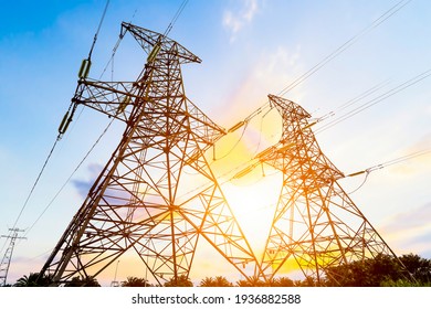 High voltage tower at dusk - Shutterstock ID 1936882588