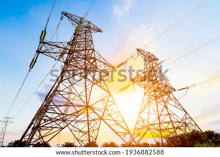 High voltage tower at dusk