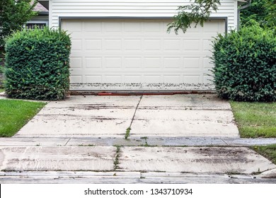 High Water Mark On Garage Door After Flood Waters Recede 