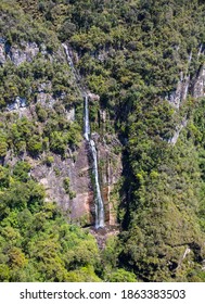 High waterfall in the forest.