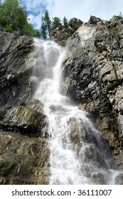 High waterfall in the mountains