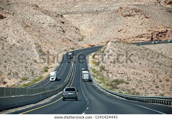 High way in desert hills in\
USA