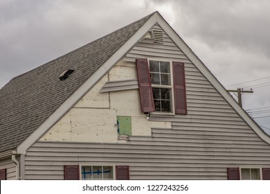 High Winds Have Damaged The Siding Of Your Home