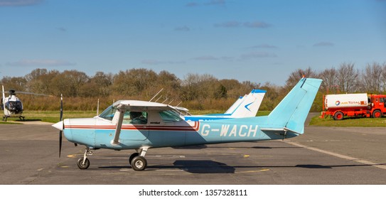 HIGH WYCOMBE, ENGLAND - MARCH 2019: Cessna Aerobat Light Trainer Aircraft With People On Board At Wycombe Air Park.