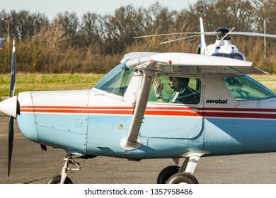 HIGH WYCOMBE, ENGLAND - MARCH 2019: Close Up Of A Cessna Aerobat Light Trainer Aircraft Taxiing At Wycombe Air Park.