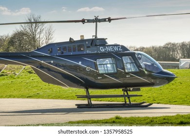 HIGH WYCOMBE, ENGLAND - MARCH 2019: Bell Longranger Helicopter On The Ground At Wycombe Air Park.