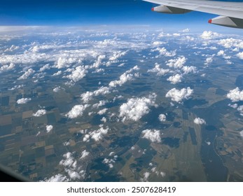 High-Altitude Aerial View of Austrian Farmland and Cloud Shadows