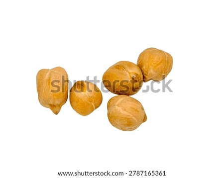 High-angle minimalist studio flat lay showcasing a small cluster of exactly five raw, dried chickpeas (garbanzo beans) arranged naturally on a clean light background. This high-definition macro shot captures the intricate, wrinkled texture and pale golden color of the legume skins in crisp detail.